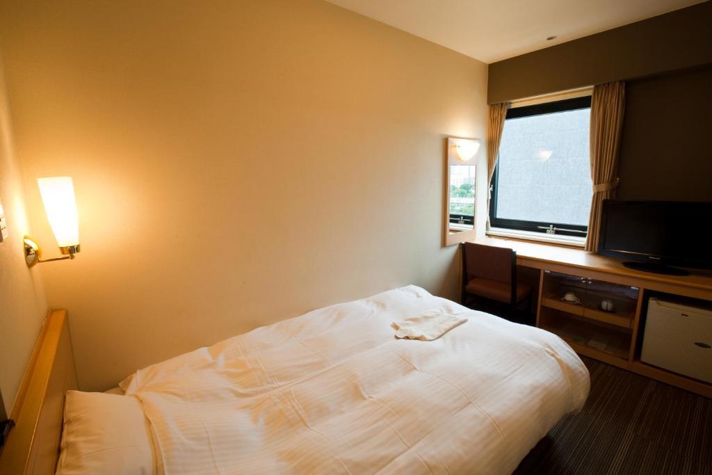 Harmonie Cinq Hotel Kitakyushu Quarto foto