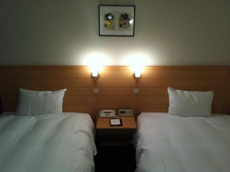 Harmonie Cinq Hotel Kitakyushu Quarto foto